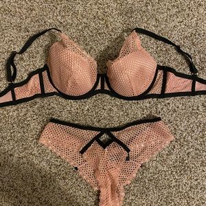 Victorias Secret fishnet lingerie set. Bra is 34D and bottoms are a size small.